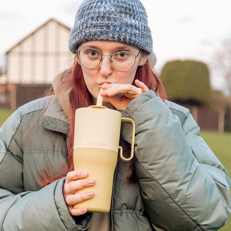 26oz-rise-tumbler-with-straw-lid-e1 26oz_rise_rumbler_straw_wax_yellow_woman_sip_square.jpg