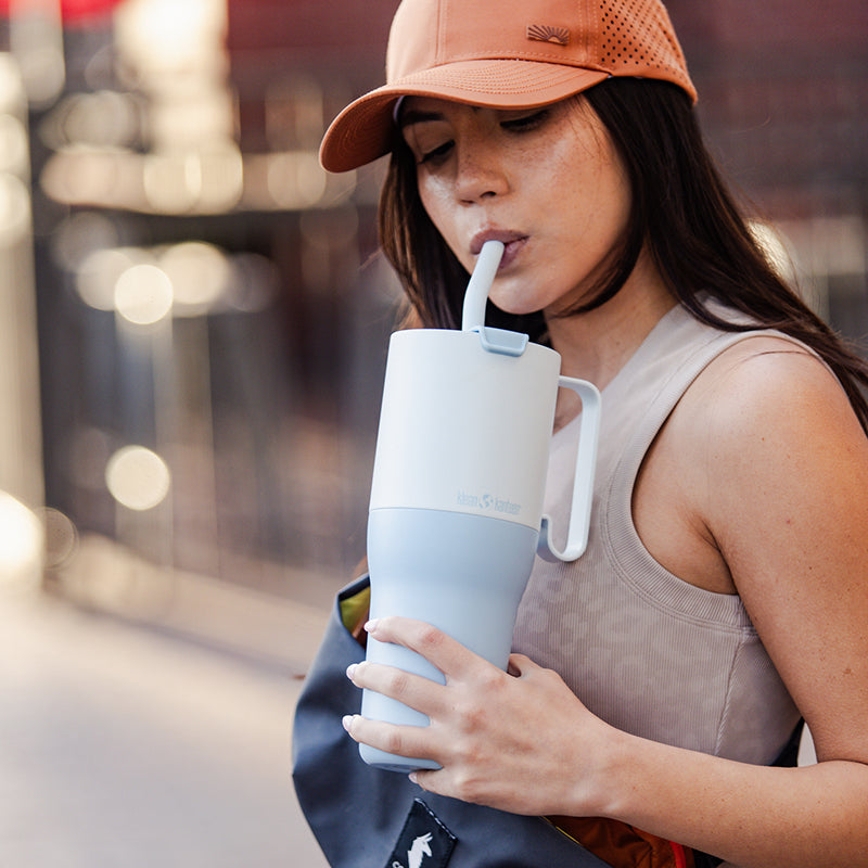 36oz-rise-tumbler-with-straw-lid-w1 36oz_rise_tumbler_straw_girl_sip_square.jpg