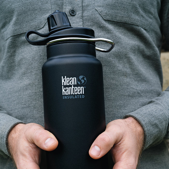 tkwide-chug-cap-u9 K32TKWSSL-SB-Craddled-Bottle_closeup_lifestyle.jpg