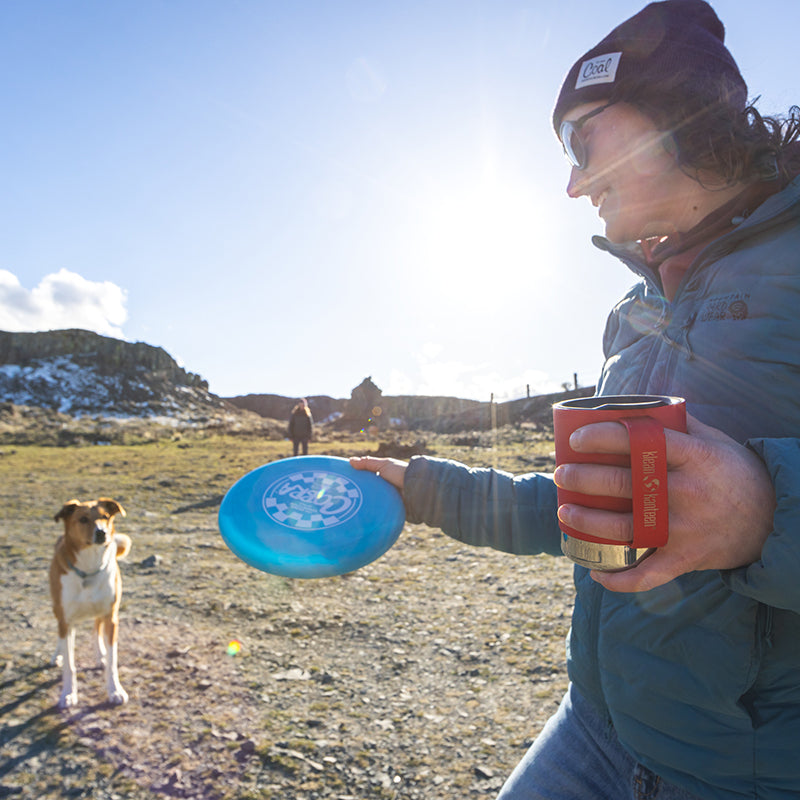 12oz-camp-mug-e7 insulated_camp_mug_12oz_woman_dog_frisbee_square.jpg