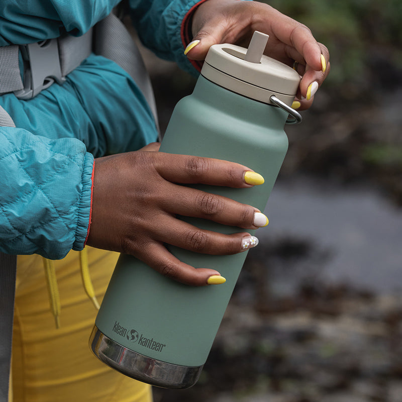 32oz-tkwide-made-to-do-more-bundle-p8 tkwide_32oz_insulated_bottle_twist_closeup_seapsray_hand_square.jpg