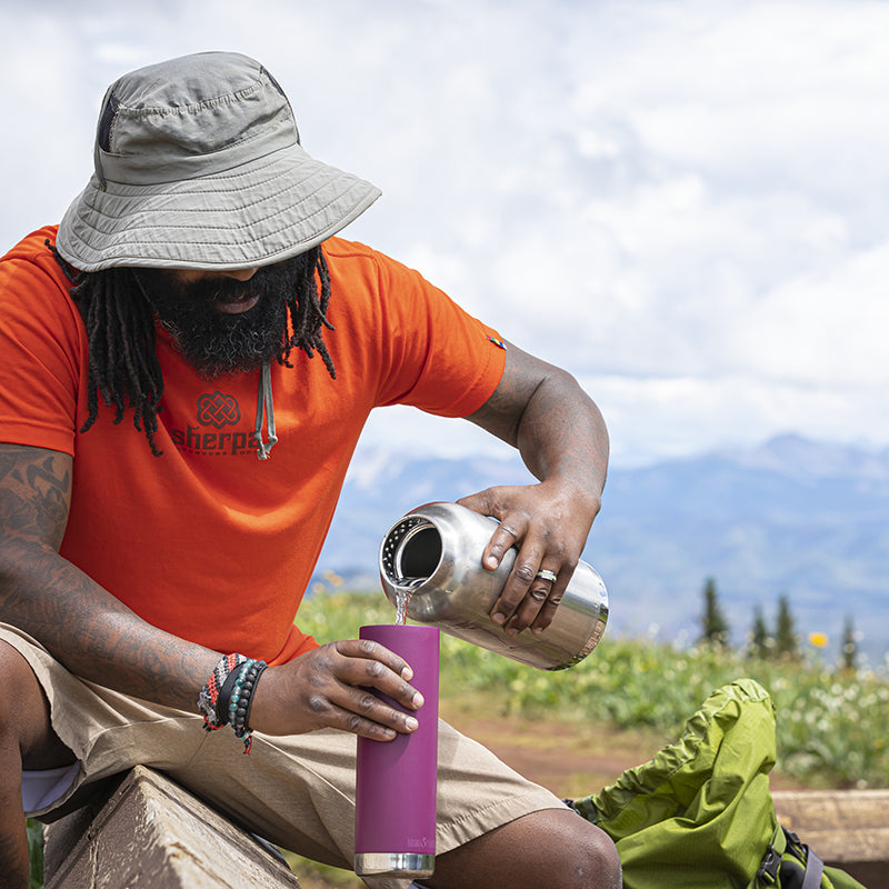 64oz-tkwide-with-loop-cap-a2 tkwide_64oz_bottle_backpacker_mountains_filling_square.jpg